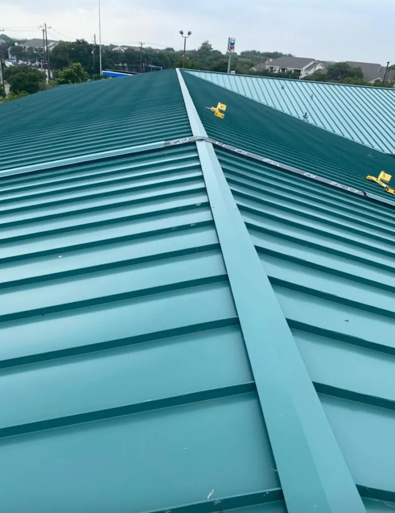 Green commercial metal roof ridge and valley for Metal Roof Repair in Madras